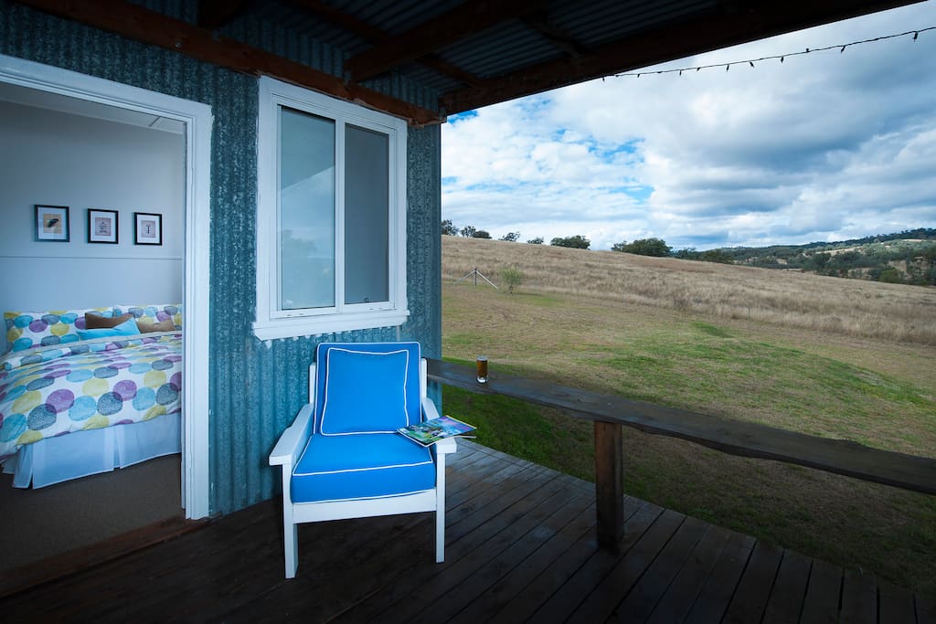One of our queen bedrooms with large deck out the front and views of the valley.