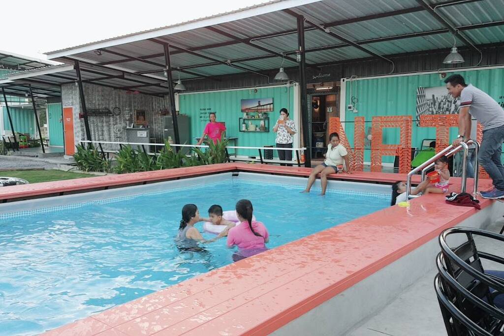 Kids enjoy the pool. Family fun.