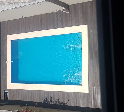 Centrally located luxury apartment. SWIMMING POOL, GARAGE, AND BREAKFAST