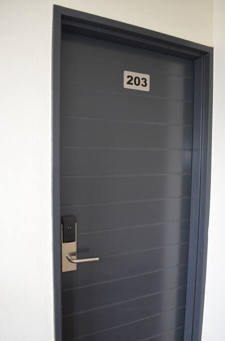 Secure magnetic card front door