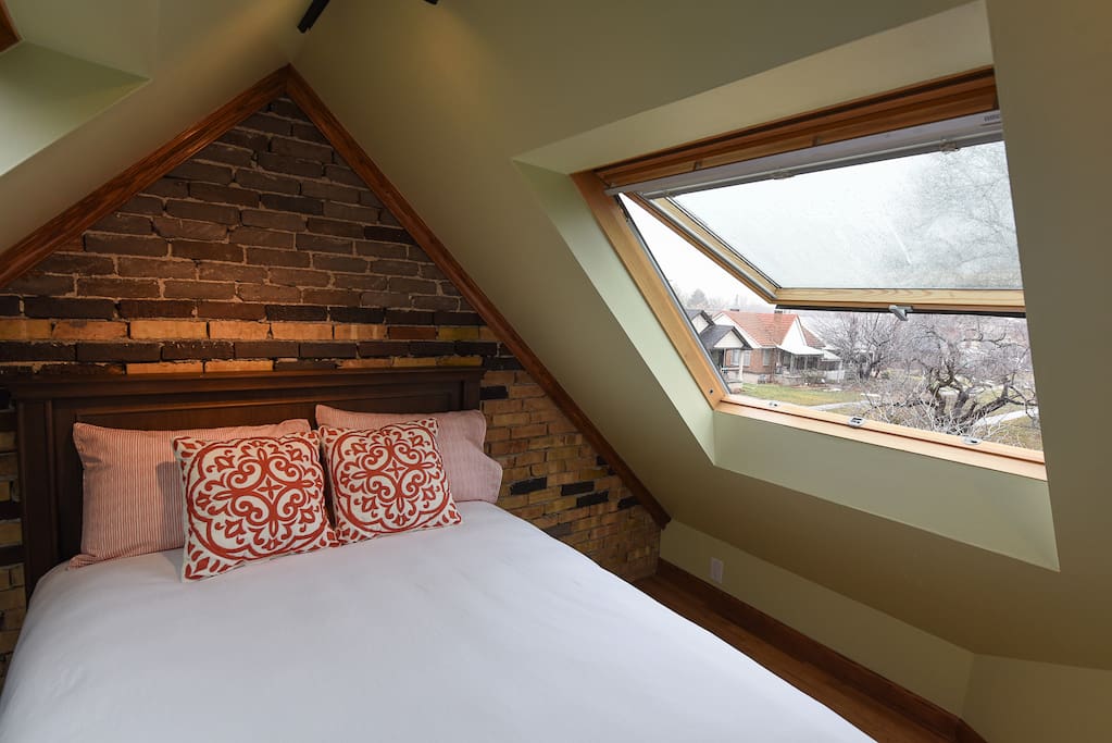 Overlook the gardens from your full size bed.