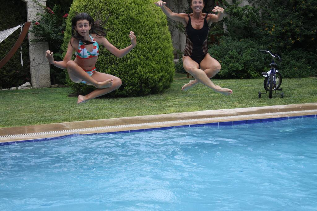 Wonderful full size pool, gardens.