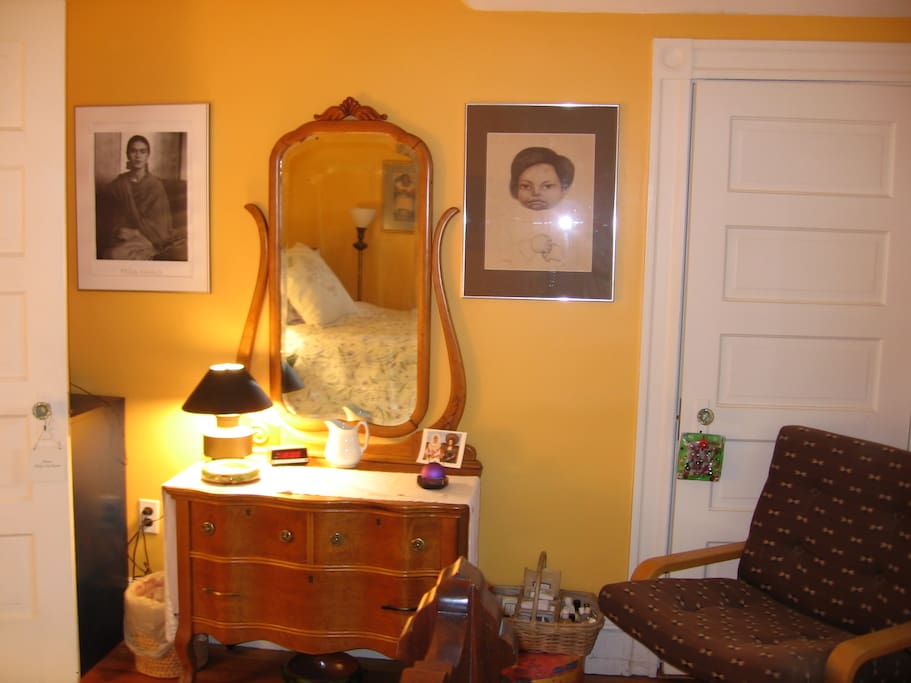 Bird's-eye maple dresser and toiet necessities in case you've forgotten anything.