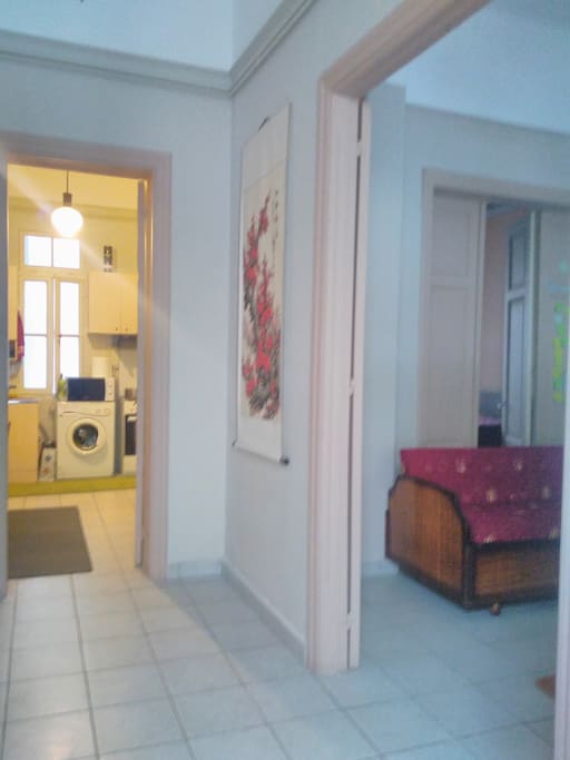 The entrance. Your room at the right side and the kitchen at left side.