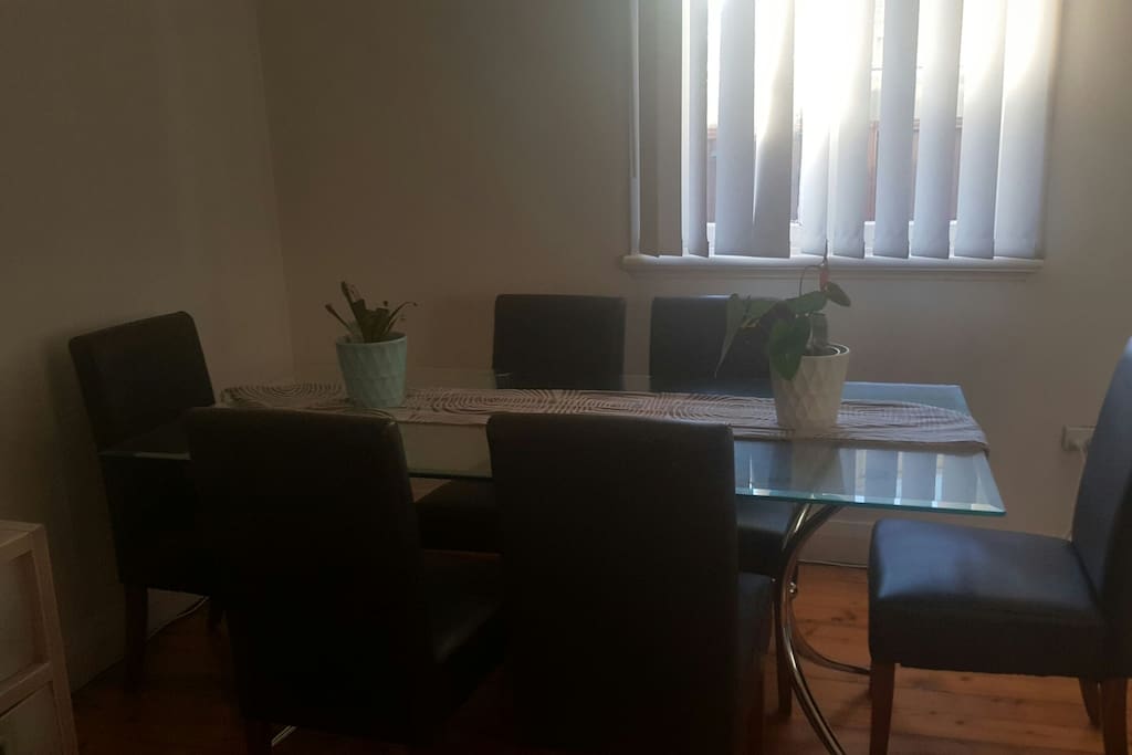 Separate dinning room with table and chairs. Also house phone available for national calls at no cost.