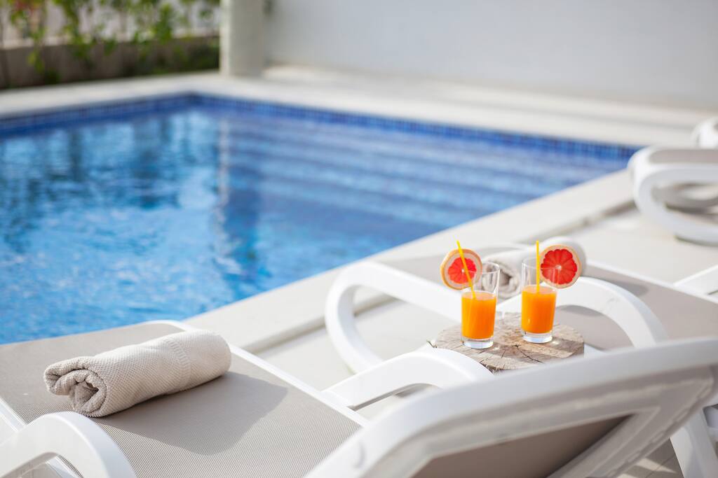 Sun lounge chairs with sea view