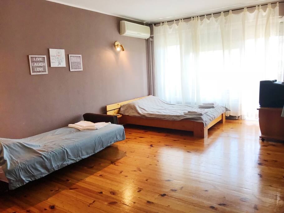 There is a nice big bedroom and a comfy couch that turns into a comfortable bed.
