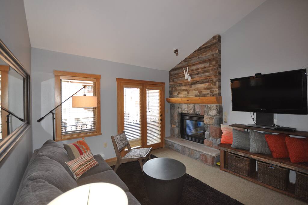 Great living space for movie watching or balcony fresh air.