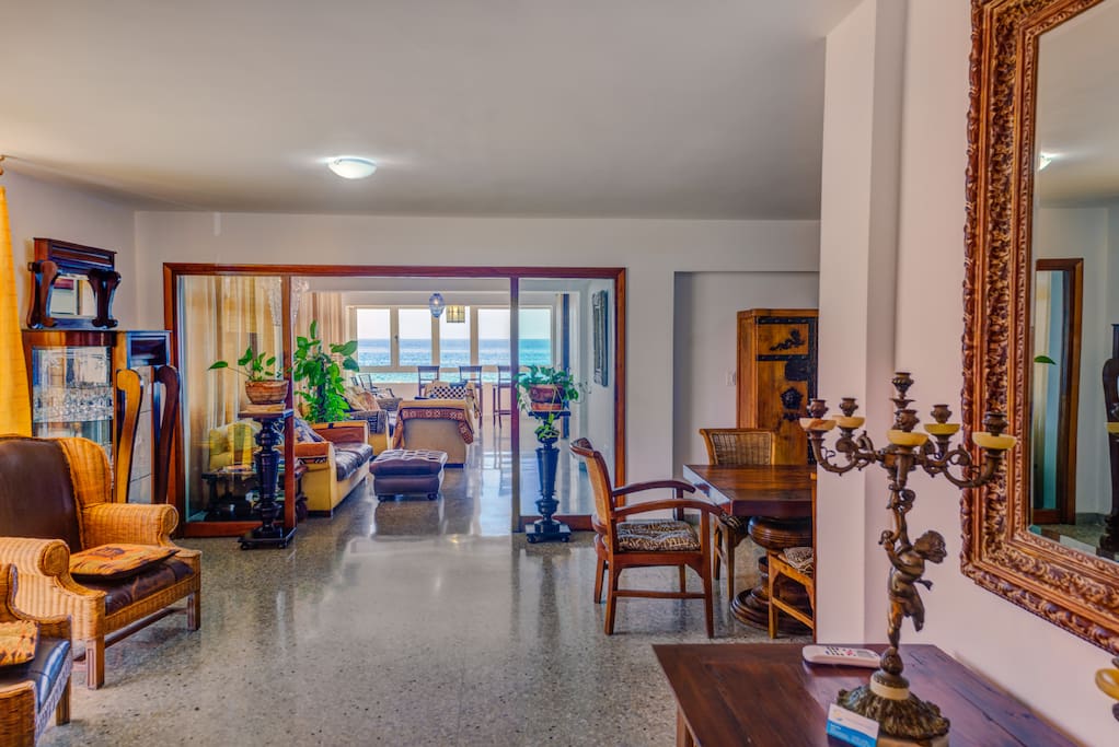 View of the foyer, dining room, lounge and enclosed veranda facing the ocean