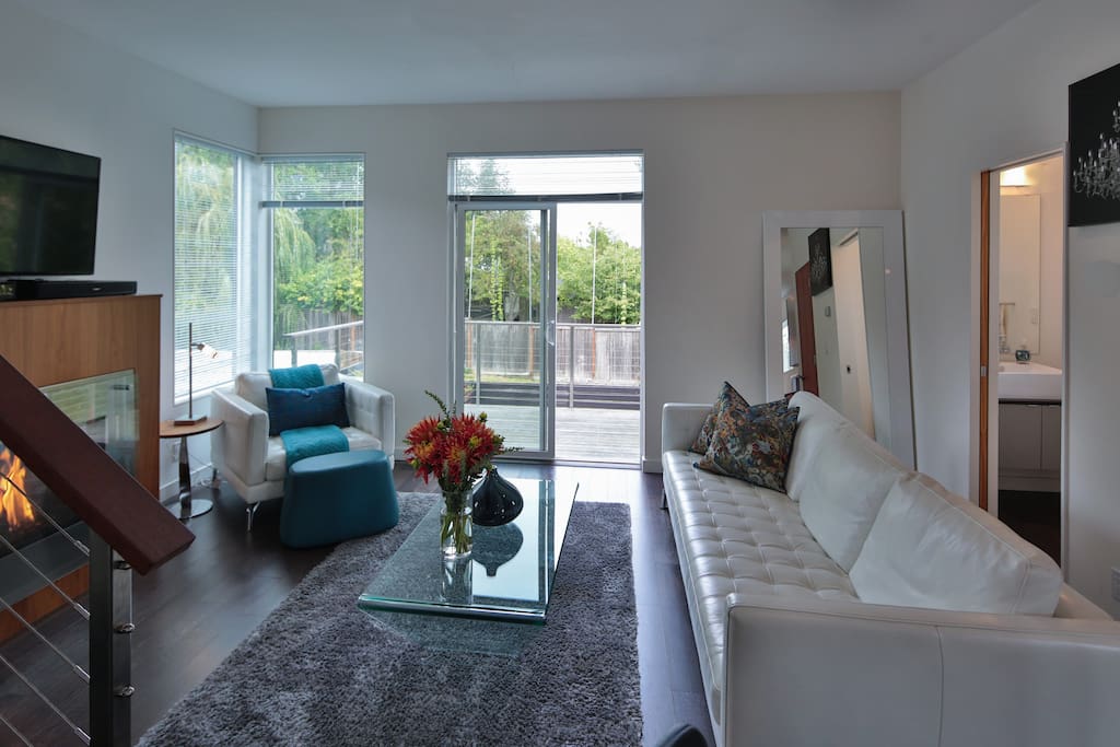 Living area of great room looking out onto the deck.