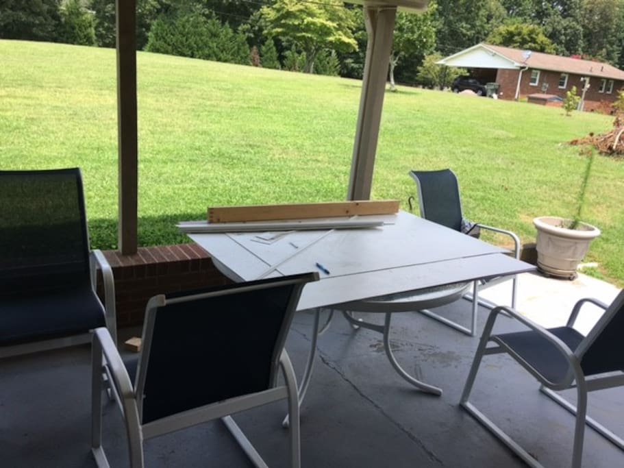 Shared, shaded patio and 1 acre yard