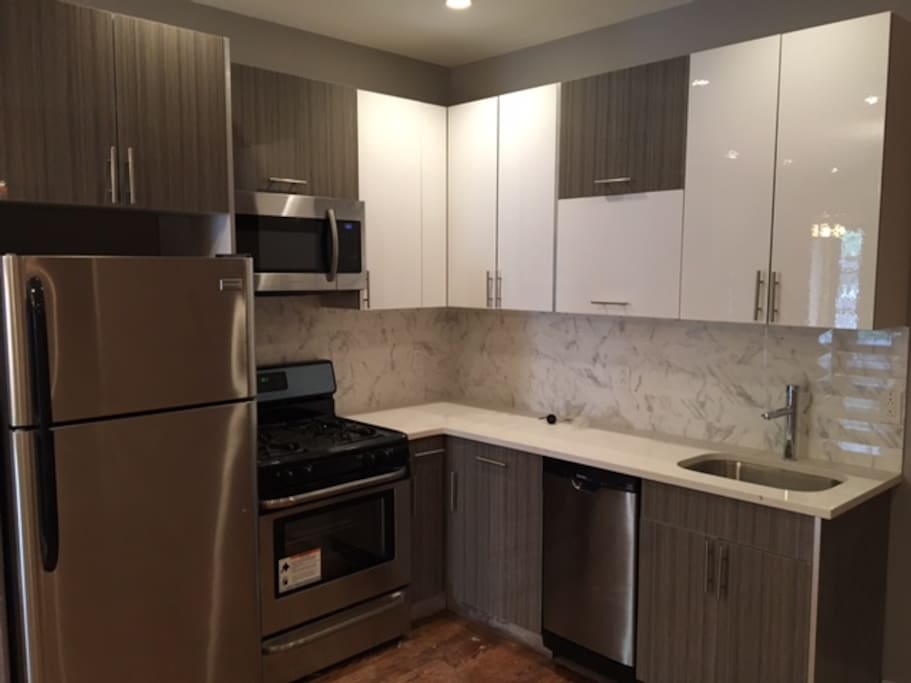 One of the 3 common kitchens available in the space.