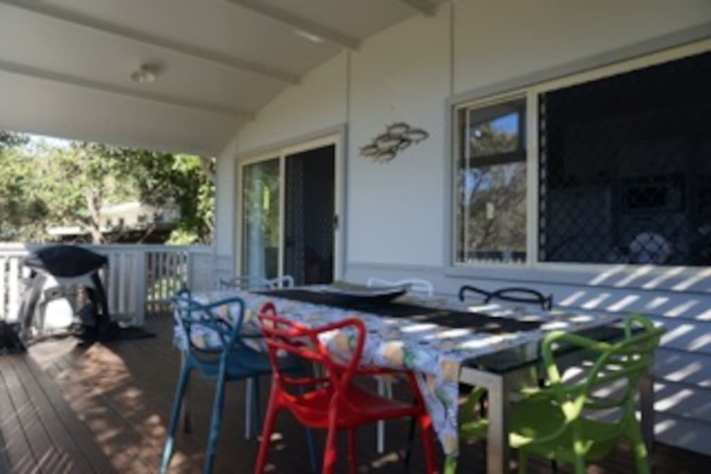 Fresh coat of paint and 6 new dining chairs on the verandah with the Weber BBQ