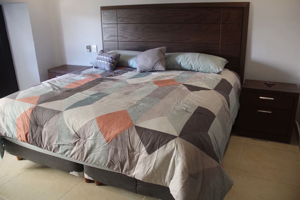 King size bed in bedroom