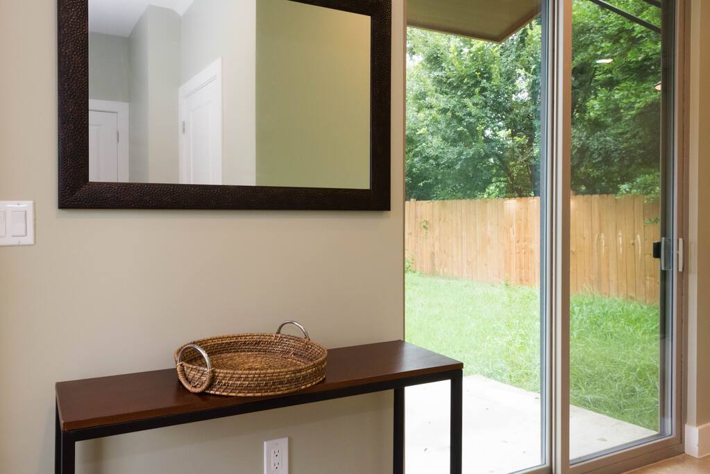 Entry Way Towards Sliding Door to Fenced Backyard