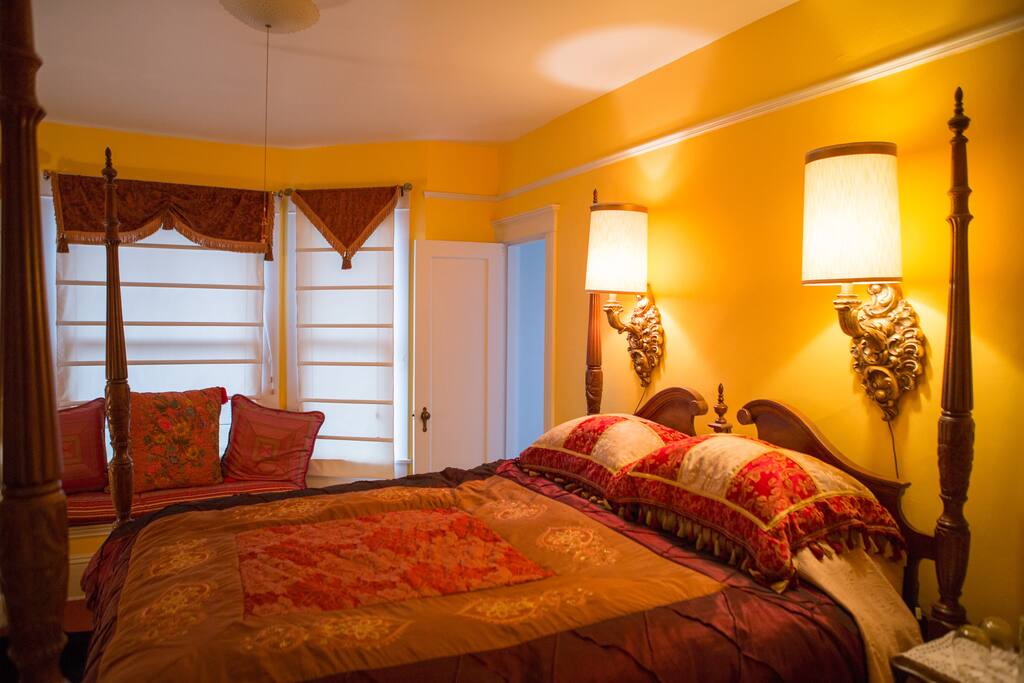 Great reading and ambiance lighting and the door in the corner leads to the private bath.