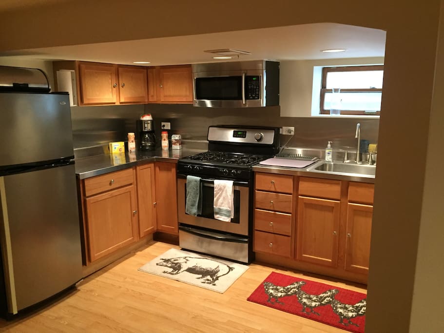 A full kitchen with stainless steel appliances, at your disposal.