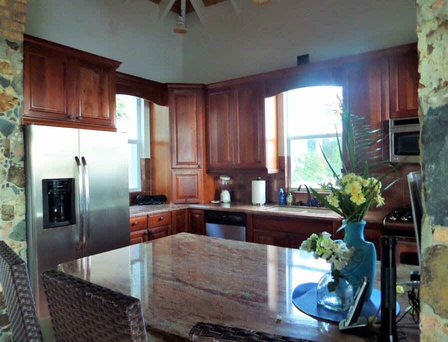 Kitchen with bar stools.