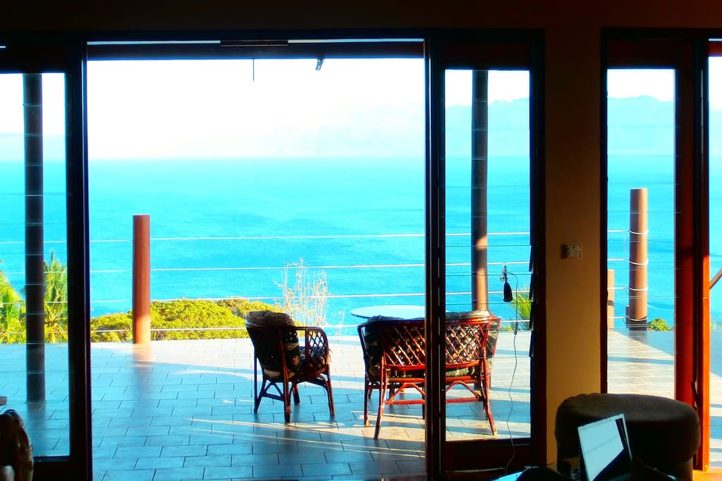view from living room 1 on ocean and sunset