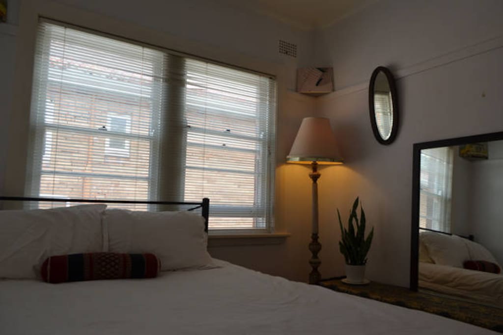 Snuggle up in this comfortable queen bedroom