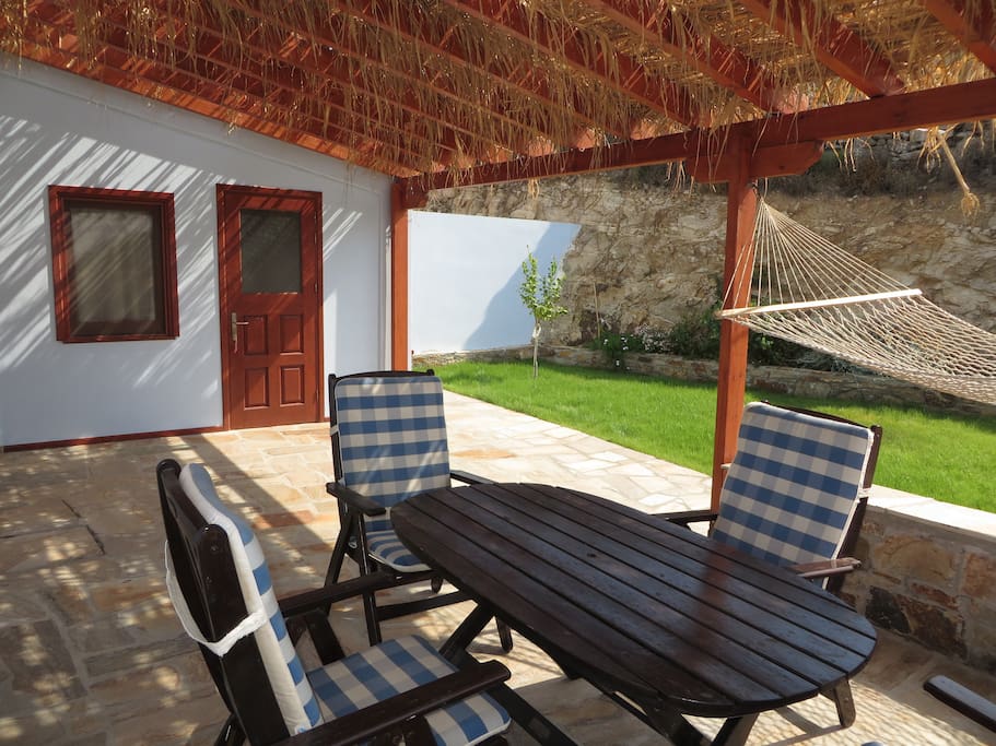 Outdoor dining. Landscaped garden areas