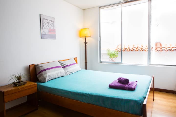 Cosy room in lively, safe area.
