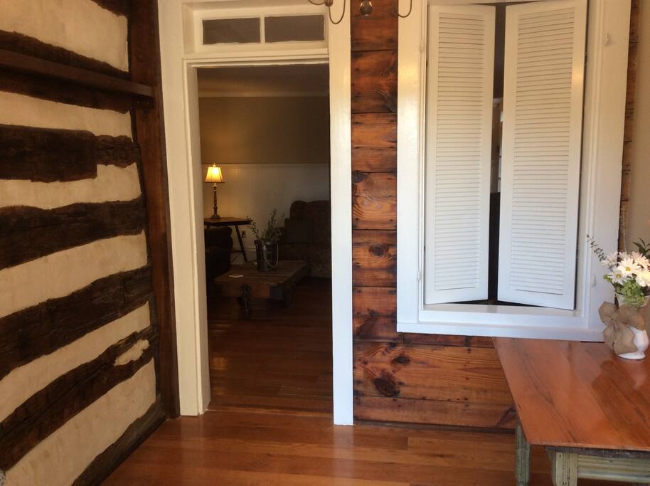 Main Entrance showing original log cabin wall