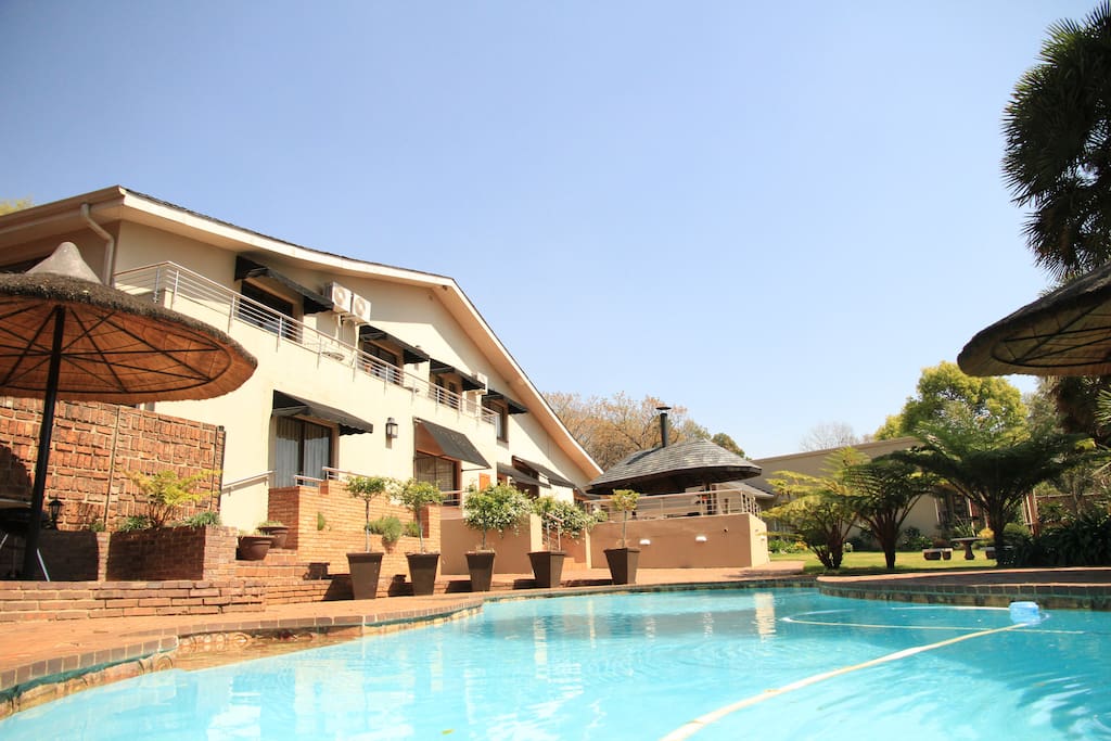 General view of Guest House and the swimming pool.