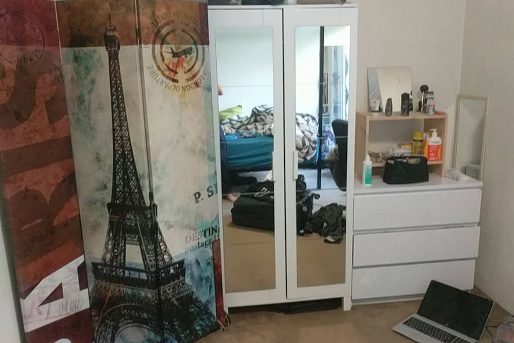 Wardrobe and drawers. (Excuse the chaos, I was making my luggage!)