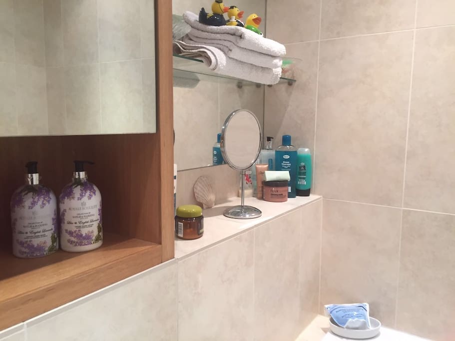 Private bathroom with bathrobes, free toiletries, hairdryer and towels.