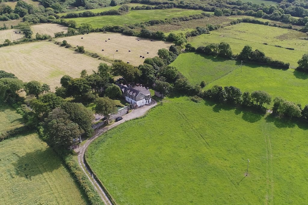 Complete privacy with beautiful surrounding farmland and views to the West of the Sea