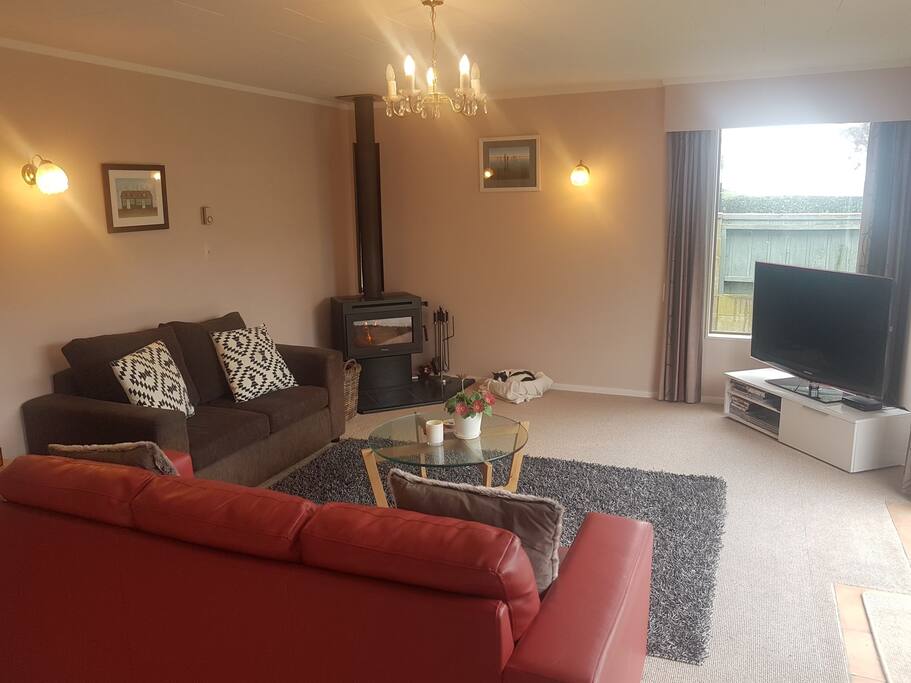 Sunny lounge, cozy woodburner for winter. Selection of children and family DVDs. Patio access.