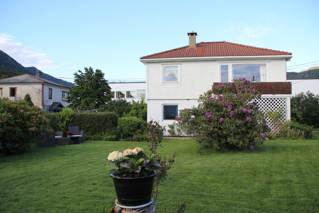 there is a big garden around the house