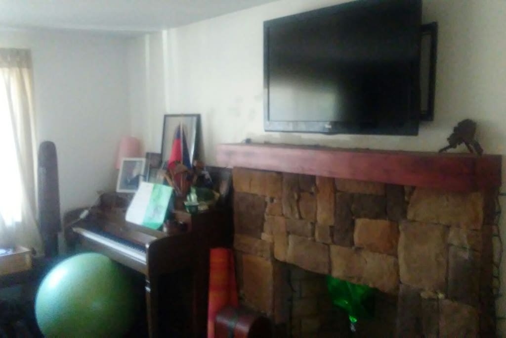 Living room Piano out of tune.