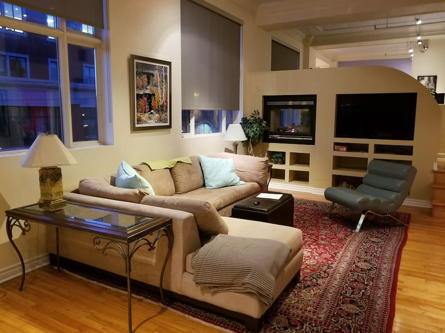 living room view toward sleeping area