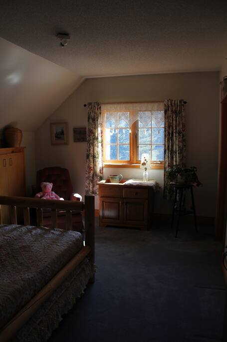 comfy single bed, with room for a cot. Larger room with queen sized bed and another twin bed are right next door. Perfect for families.
