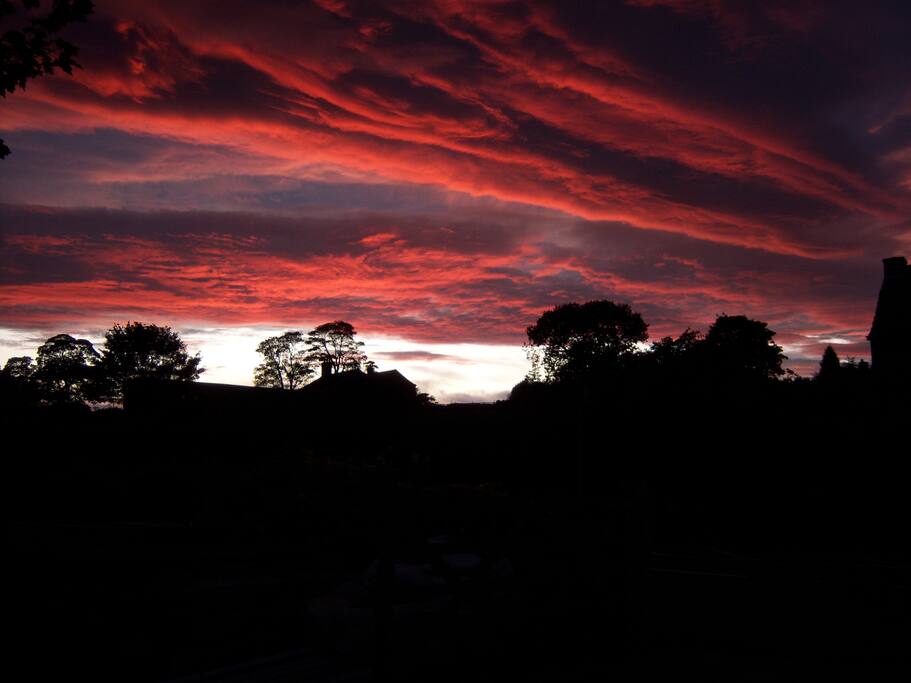 dramatic sunset from bedroom window