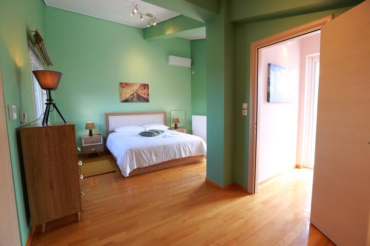 The master bedroom connected with a spacious private balcony 20sqm with 180’ mountain and town view ! 