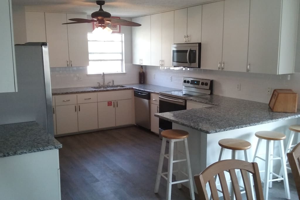 GRANITE, ALL STAINLESS, TONS OF CABINETS,