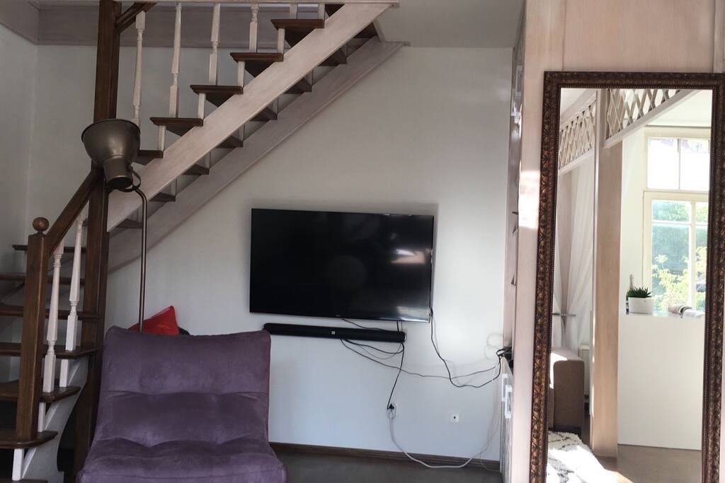 Smart TV with USB and amazing sound bar more than 50 channels and internet connection. Watch a movie and cover yourself to enjoy even if it is raining outside ;-)