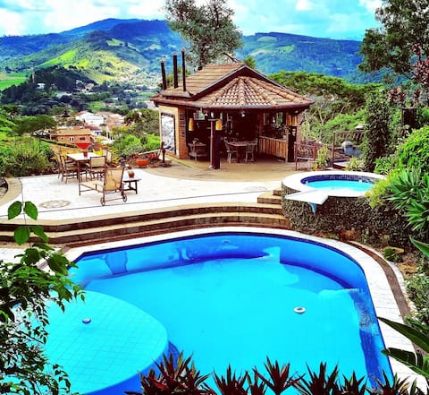 Bali house overlooking mountains and pool