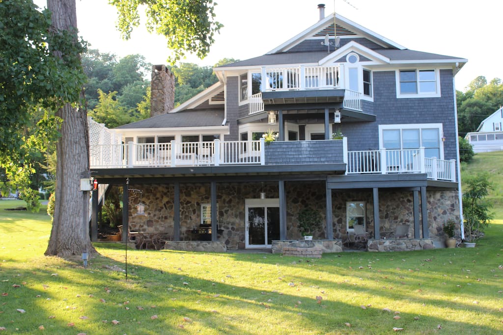 Rear view of house, entry will be on lower level patio