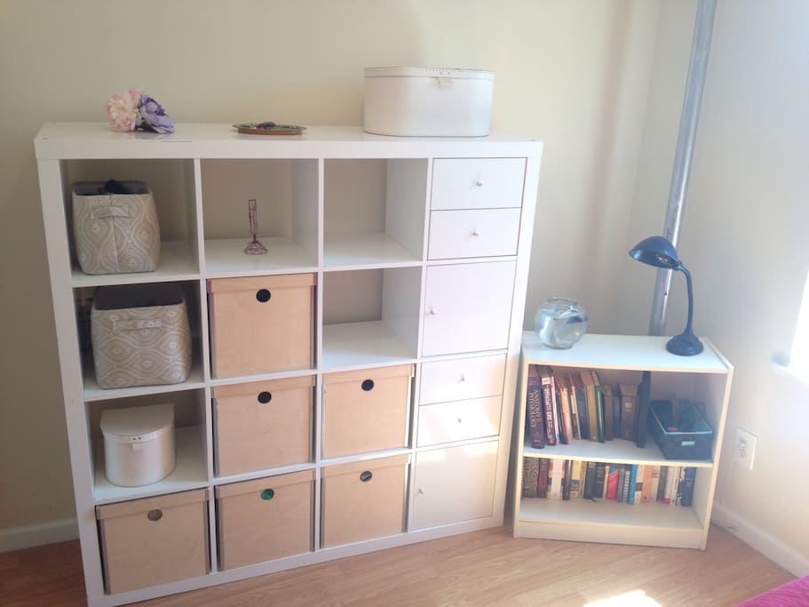 Storage for your trinkets and some books to peruse.