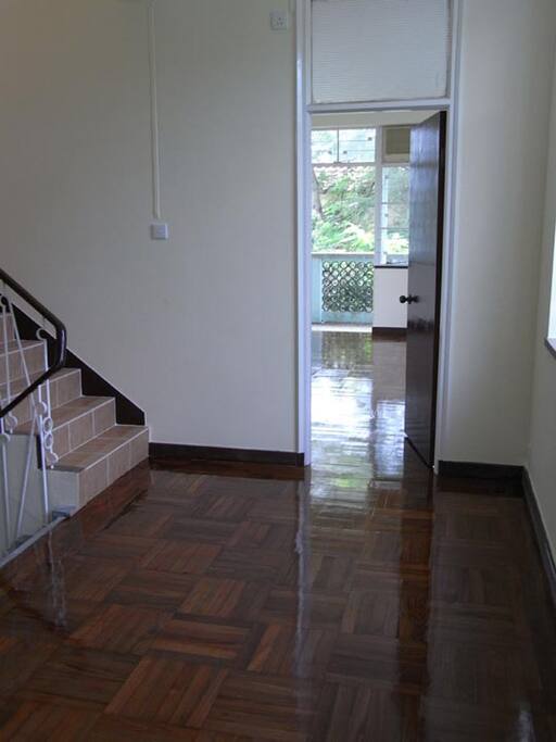 room 1 next to staircase to rooftop