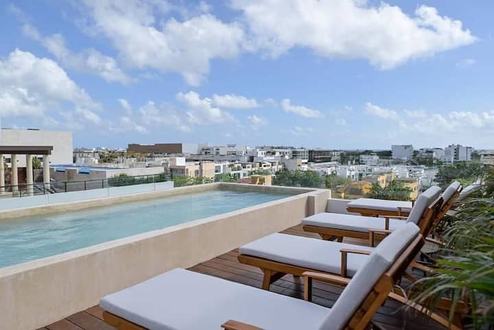 Upscale Condominiums With Rooftop Pool Cigar Lounges photo