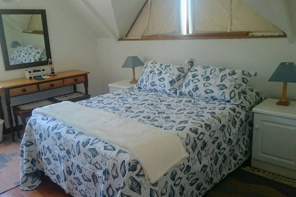 Main bedroom with Queen bed and en-suite bathroom with shower only