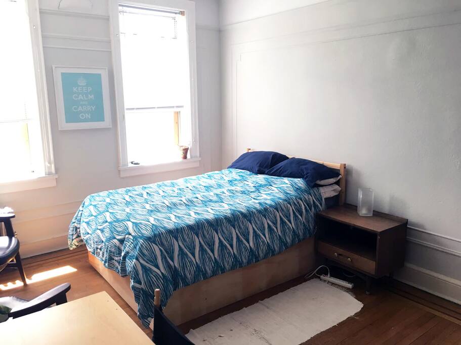 Double bed with 5" memory foam padding and a selection of pillows.