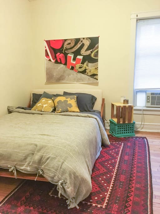 Air conditioned bedroom with queen sized bed