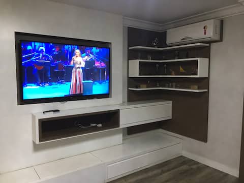 Successful Airbnb property: House with 2 en-suite bedrooms and 1 bedroom, half bath, and 2 regular parking spaces in Chapecó