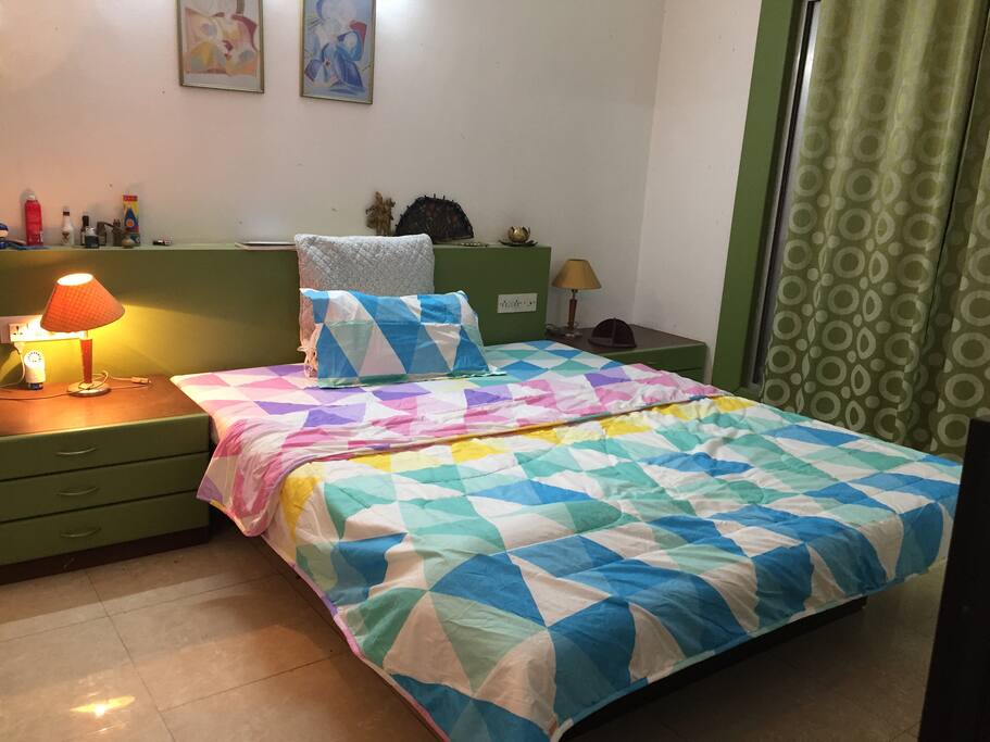 Fun or cozy feeling around this bed area has beautiful balcony over looking to the trees and garden